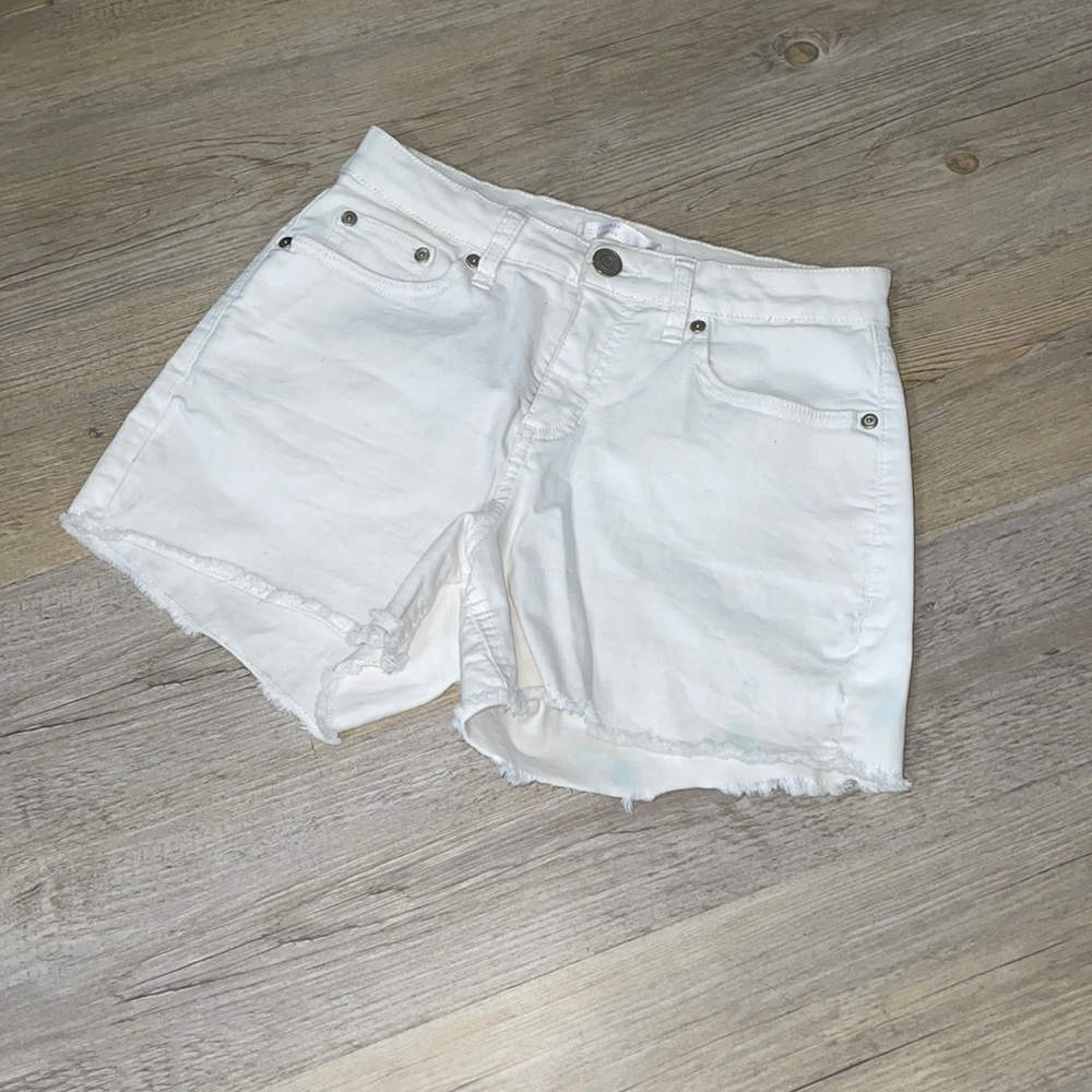 Frayed white shorts